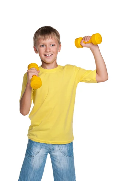 Cheerful boy with dumbbells — Stock Photo, Image