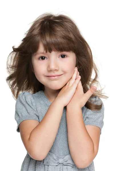 Niña tímida contra el blanco — Foto de Stock