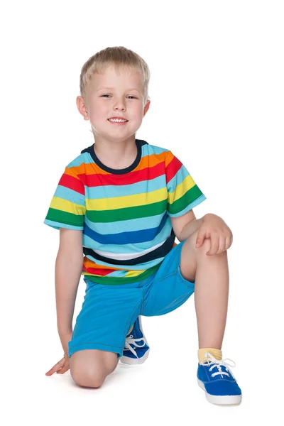 Gelukkig kleine jongen op de witte achtergrond — Stockfoto