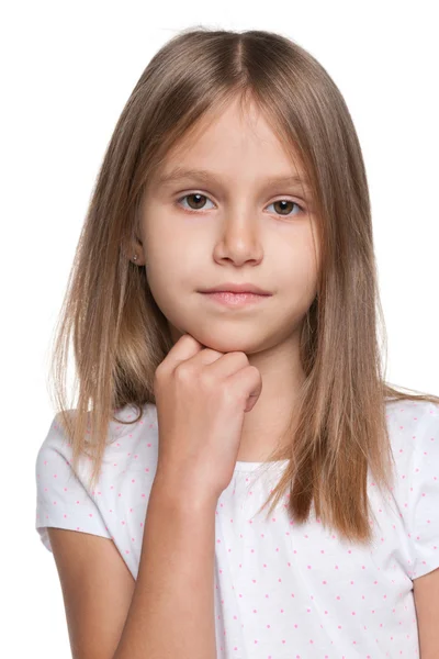 Pensive little girl against the white background — Stock Photo, Image
