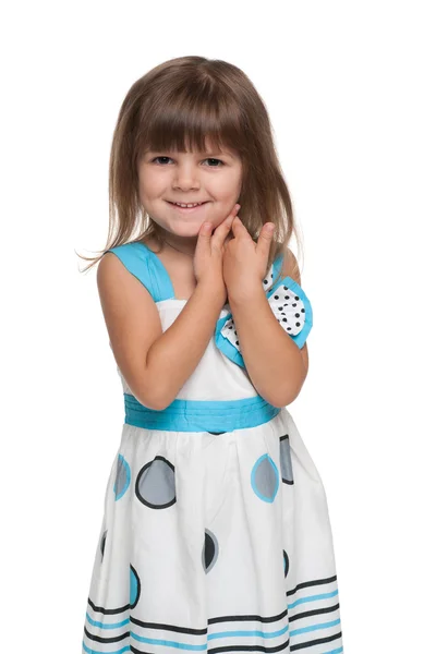 Pretty little girl against the white — Stock Photo, Image