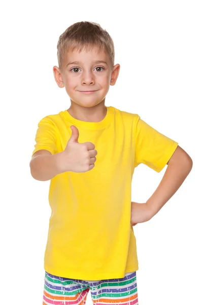 Kleine jongen houdt zijn duim omhoog — Stockfoto