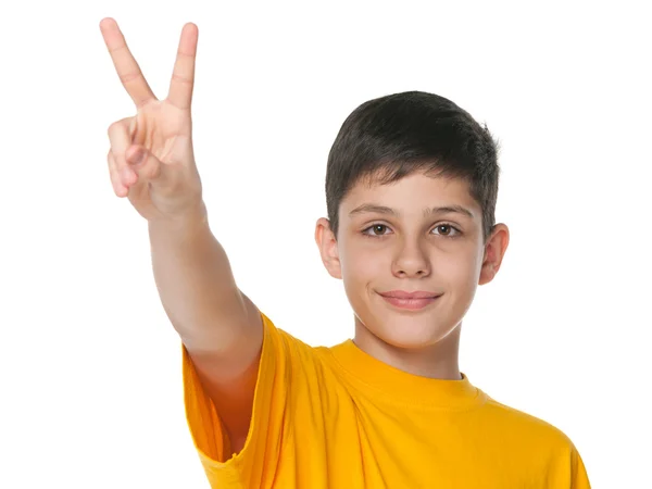 Preteen boy celebrates victory — Stock Photo, Image