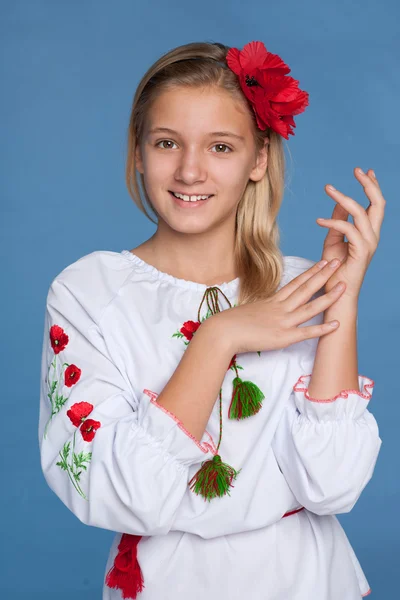 Ukrainian girl on the blue background — Stock Photo, Image