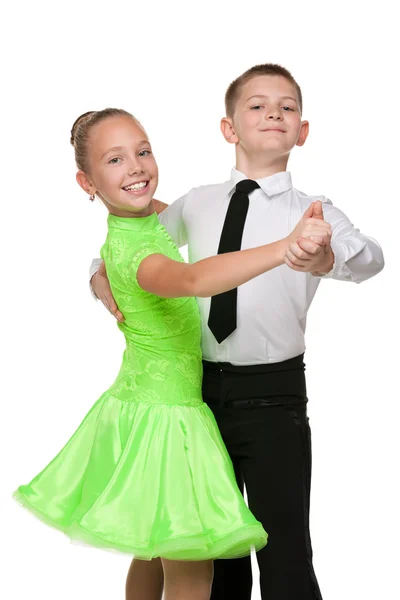 Boy and girl are dancing together — Stock Photo, Image