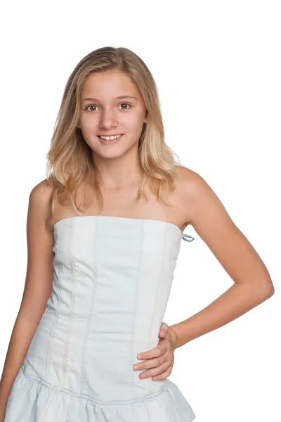 Blonde young girl against the white — Stock Photo, Image