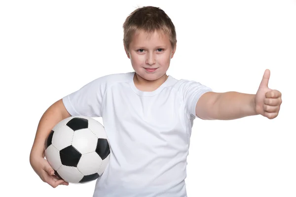 Happy young boy with soccer ball — Stock Photo, Image