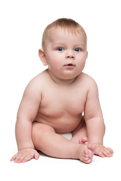 Niño sentado en el fondo blanco —  Fotos de Stock