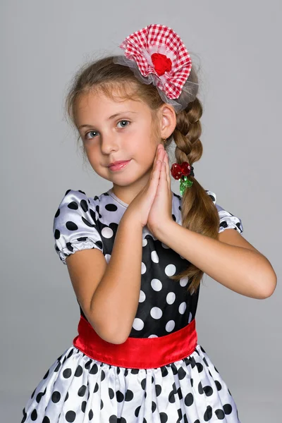 Adorable niña en un vestido de moda —  Fotos de Stock