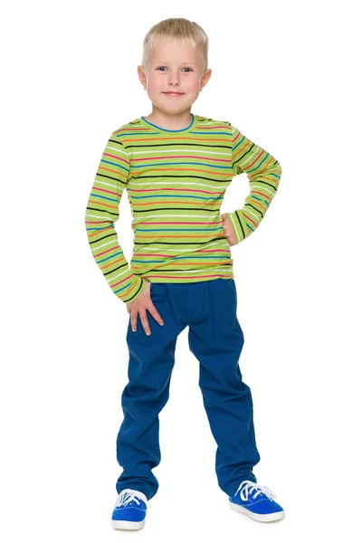 Guapo niño en los pantalones azules — Foto de Stock