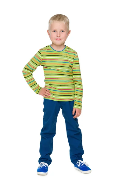 Модный маленький мальчик в синих штанах — стоковое фото