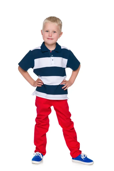 Moda menino nas calças vermelhas — Fotografia de Stock