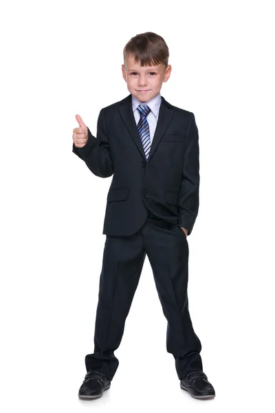 School boy holds his thumb up — Stock Photo, Image