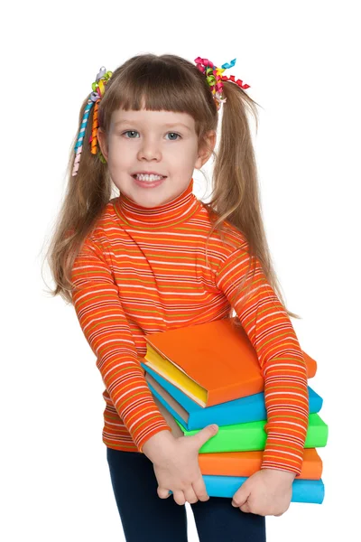 Clever little girl holds books — Stock Photo, Image