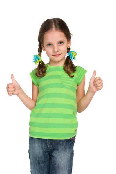 Pretty little girl holds her thumbs up — Stock Photo, Image