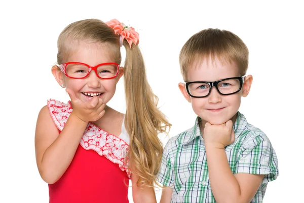 Two happy clever kids Royalty Free Stock Photos