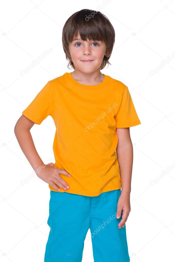 Smiling little boy in a yellow shirt