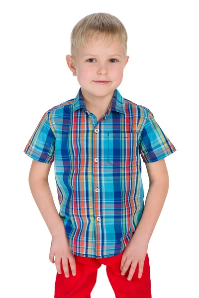 Handsome young boy in the red pants — Stock Photo, Image