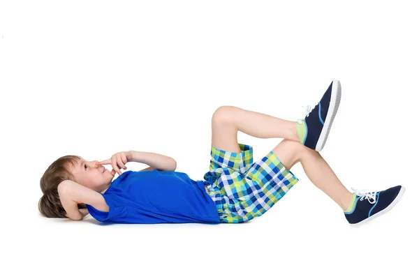 Little boy imagines on the floor — Stock Photo, Image