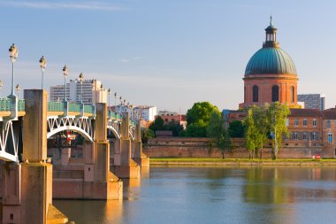 Toulouse in a summer evening clipart