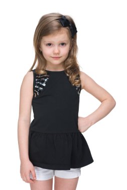 Sevimli küçük kız beyaz karşı duruyor