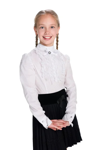 Pretty schoolgirl against the white — Stock Photo, Image