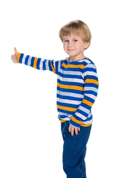 Blond little boy holds his thumb up — Stock Photo, Image