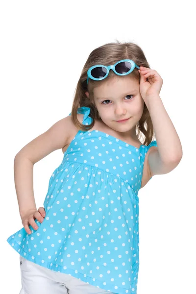 Little girl in a polka dot blue dress — Stock Photo, Image