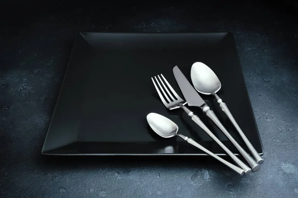 Cutlery Black Square Dish Dark Textured Background Table Setting — Stock Photo, Image