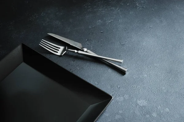 Cutlery Black Square Dish Dark Textured Background Table Setting — Stock Photo, Image