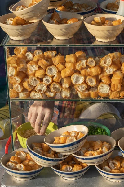 Many fried bread dough - youtiao at at breakfast stall — Stock Photo, Image