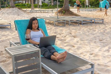 Asian freelancer working from home in the pandemic time