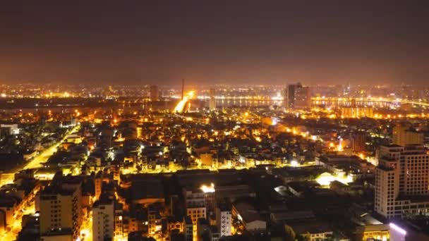 Cinematic time-lapse view of an industrialized city in Asia from night to day. — Stok video