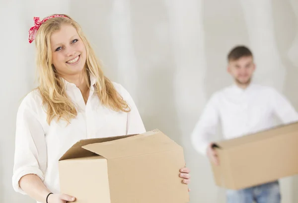 Happy young couple moving in their new home — Stock Photo, Image