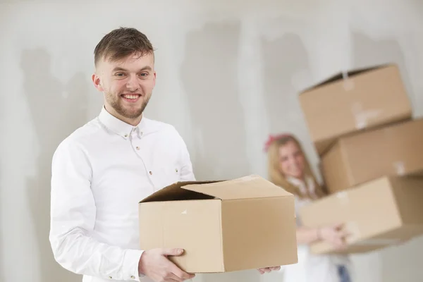 Happy young couple moving in their new home — Stock Photo, Image