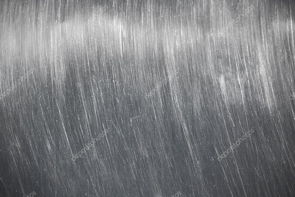 Metal scratched surface Stock Photo by ©mexrix 65511071