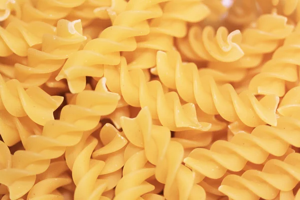 Fusilli pasta achtergrond — Stockfoto