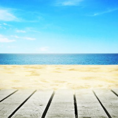 Table near sea with blue sky