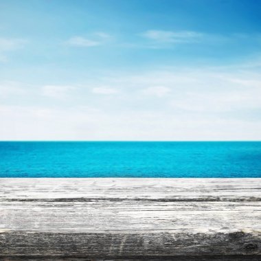 Table near sea with blue sky