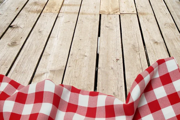 Tischdecke auf Holz — Stockfoto