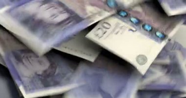 İngiliz Sterlini rengarenk arkaplanda düşüyor