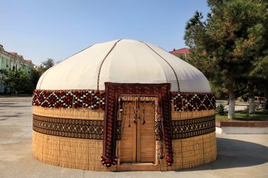 Turkmen ethnic nomadic yurt-building, built for the celebration  clipart