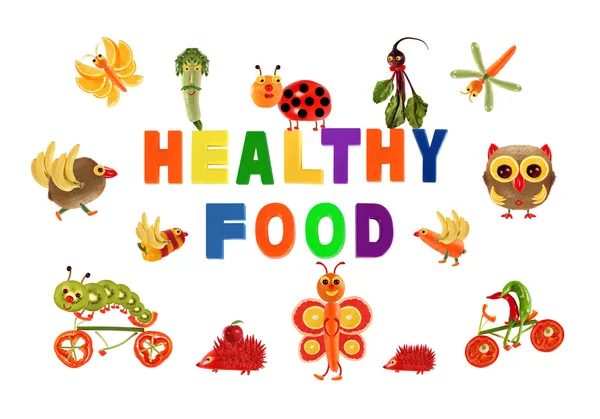 Gezond eten. Weinig grappig groenten rond het woord gezond — Stockfoto