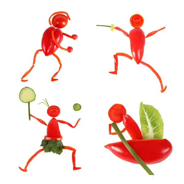 Alimentación saludable. Pequeñas personas divertidas hechas de verduras y frutas — Foto de Stock