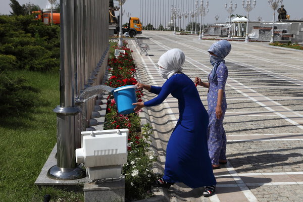 Ashgabat, Turkmenistan - February 26, 2013. Women engaged in man