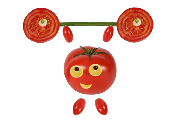 Pequeño tomate divertido levanta la barra — Foto de Stock