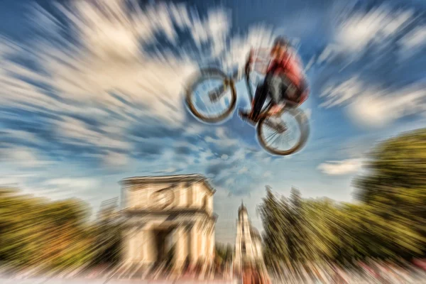 Abstract background . Boy on a BMX mountain bike jumping. Motion — Stock Photo, Image