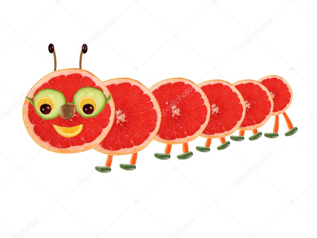Creative food concept. Funny little  caterpillar made from fruit