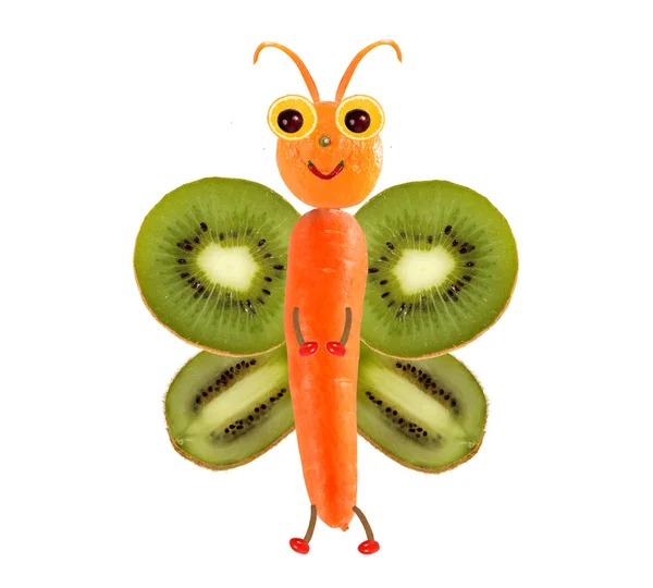 Concepto de comida creativa. Pequeña mariposa divertida hecha de frutas y Fotos de stock libres de derechos