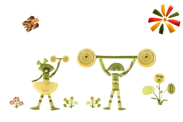 Kreativ mat koncept. Barn sportsmen tillverkad av kiwi — Stockfoto